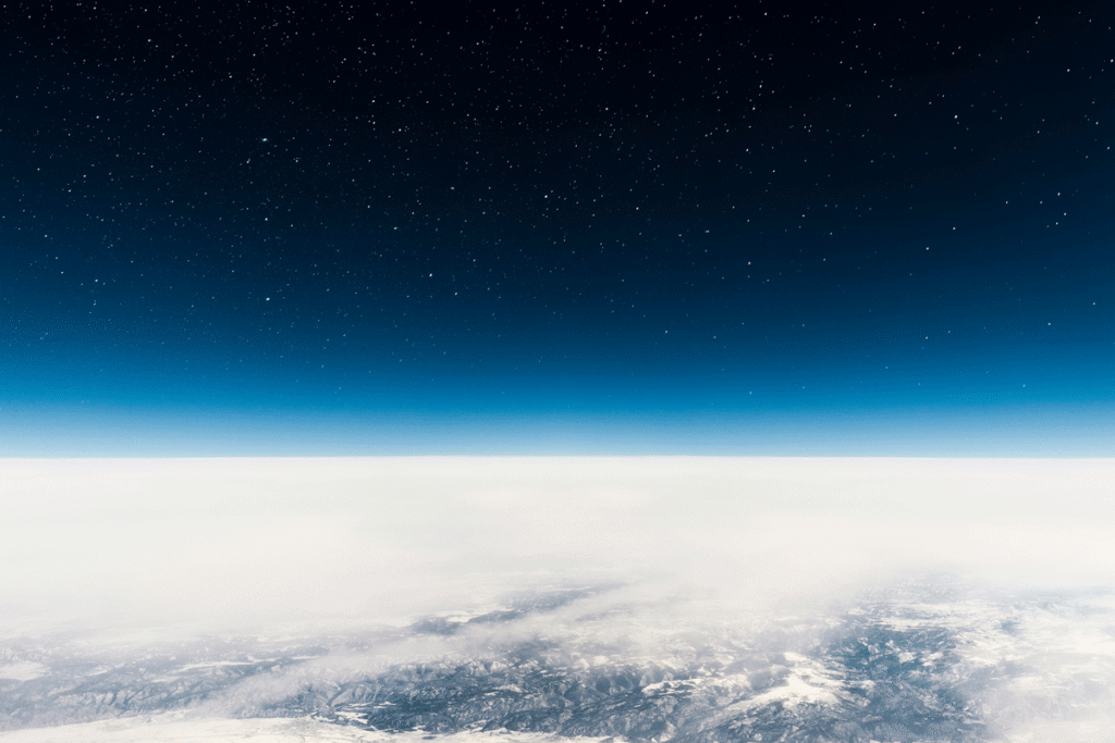 View of Earth and space from the upper atmosphere