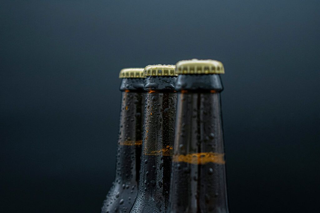Three glass beer bottles