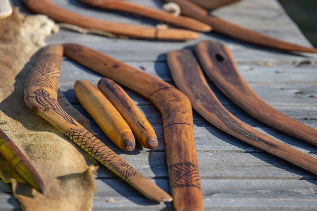 Several wooden boomerangs