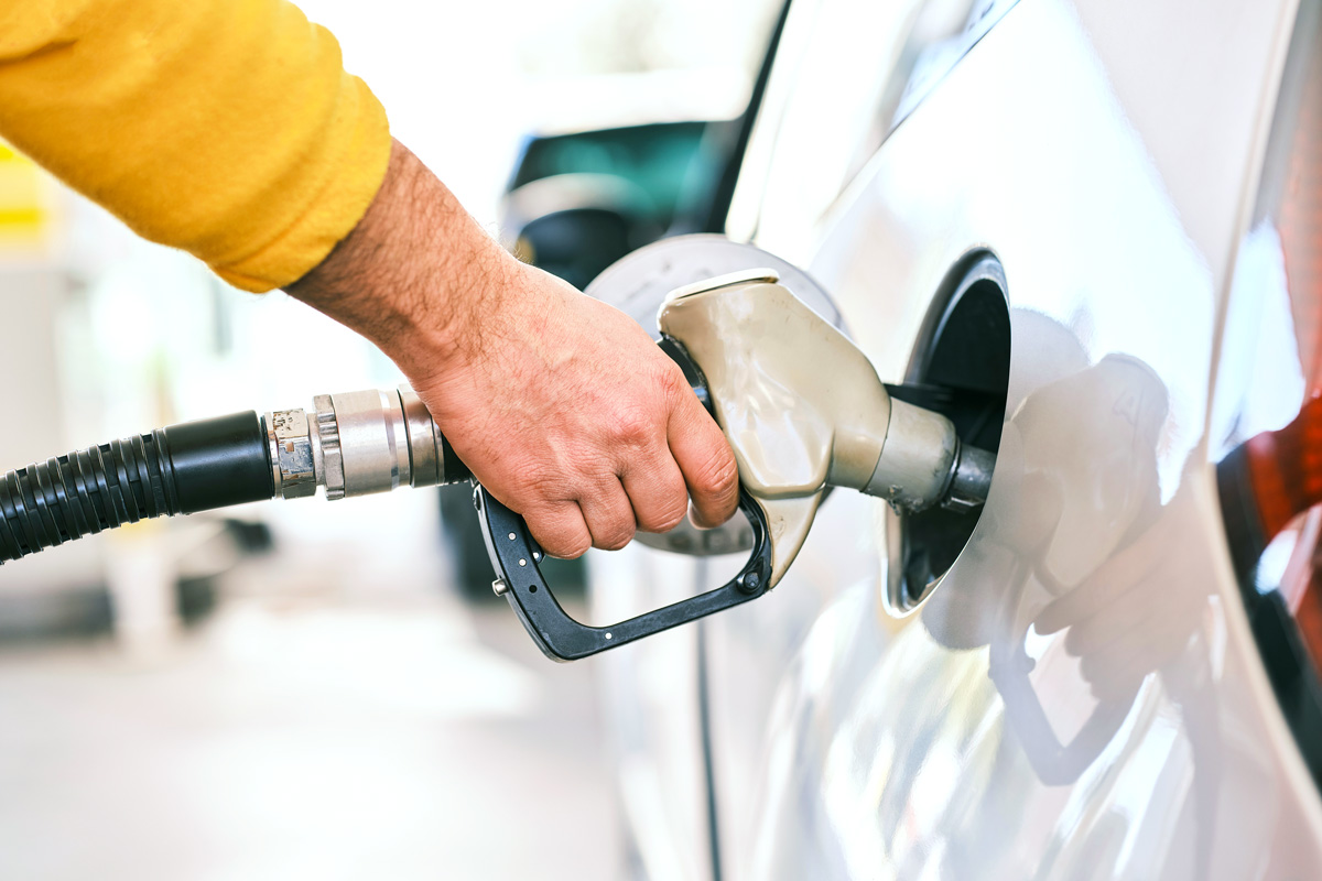 Vehicle being pumped full of fuel