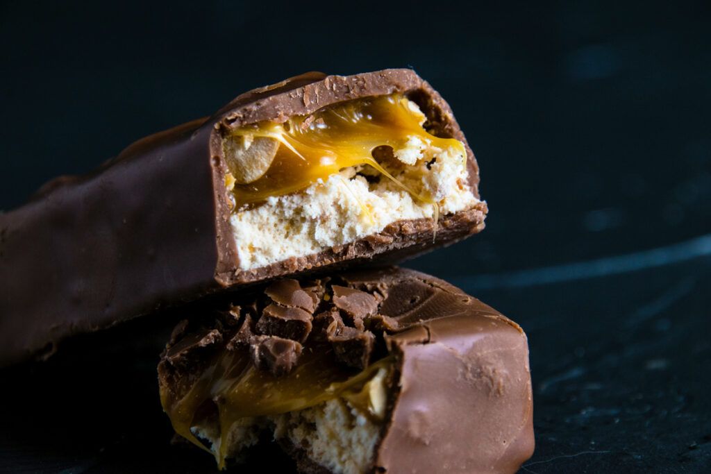 Cross-section of a candy bar with a thick nougat layer