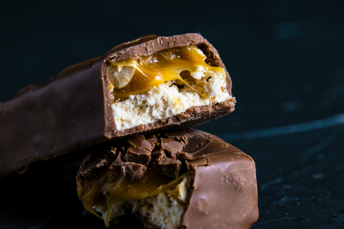 Cross-section of a candy bar with a thick nougat layer