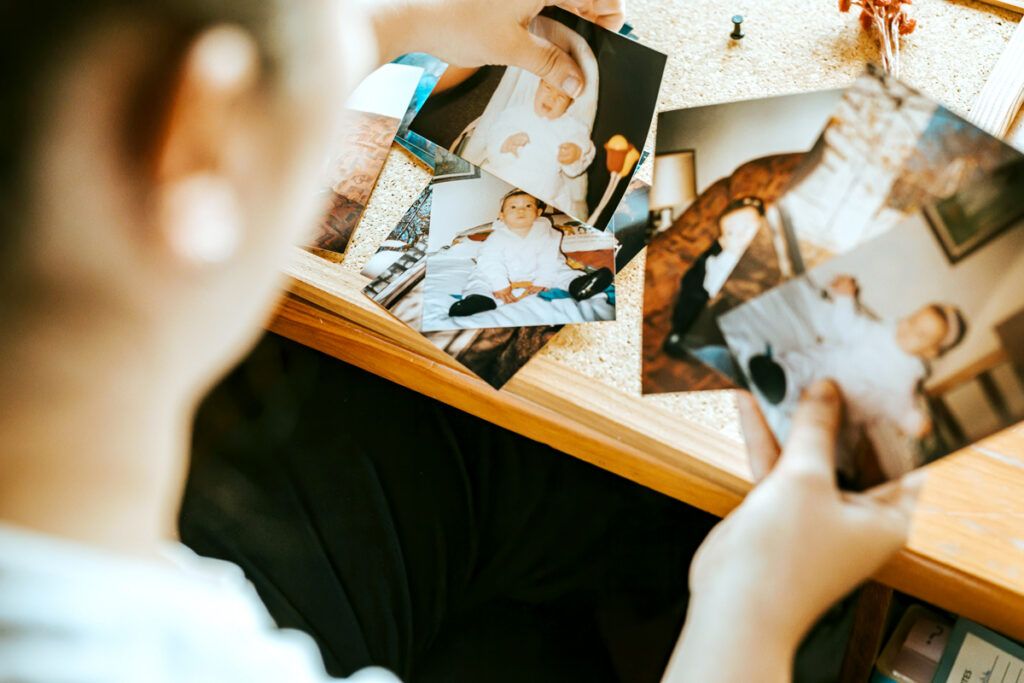 Person looking at family photos