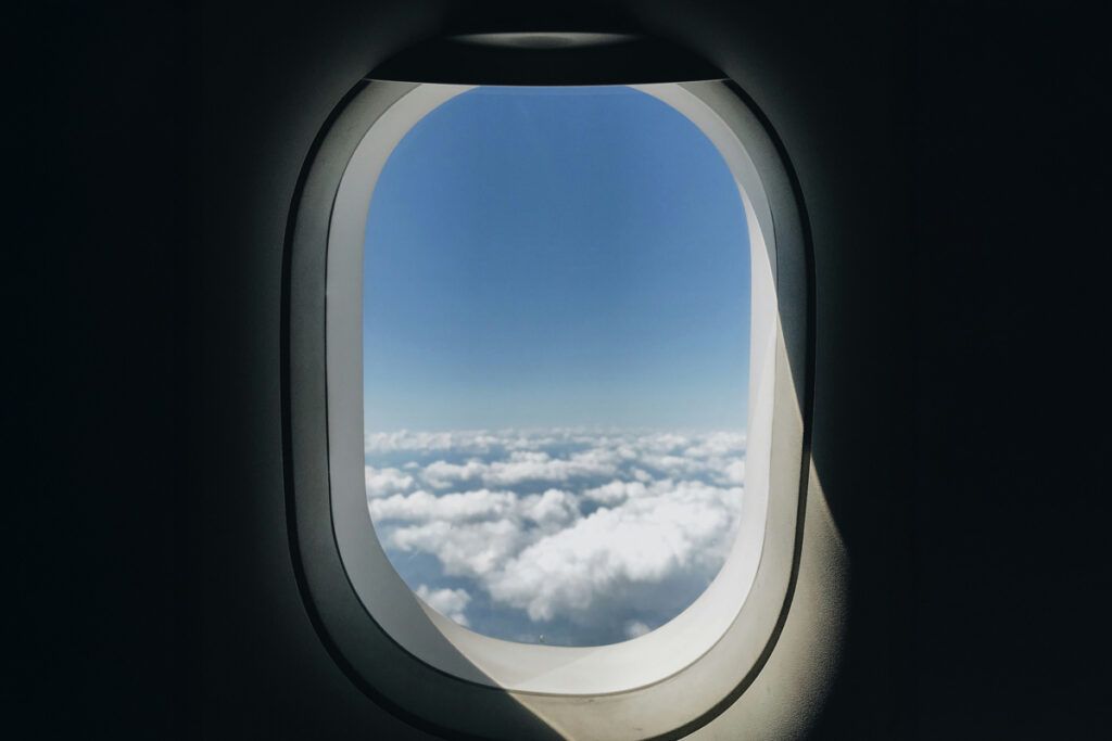 Airplane window looking outside