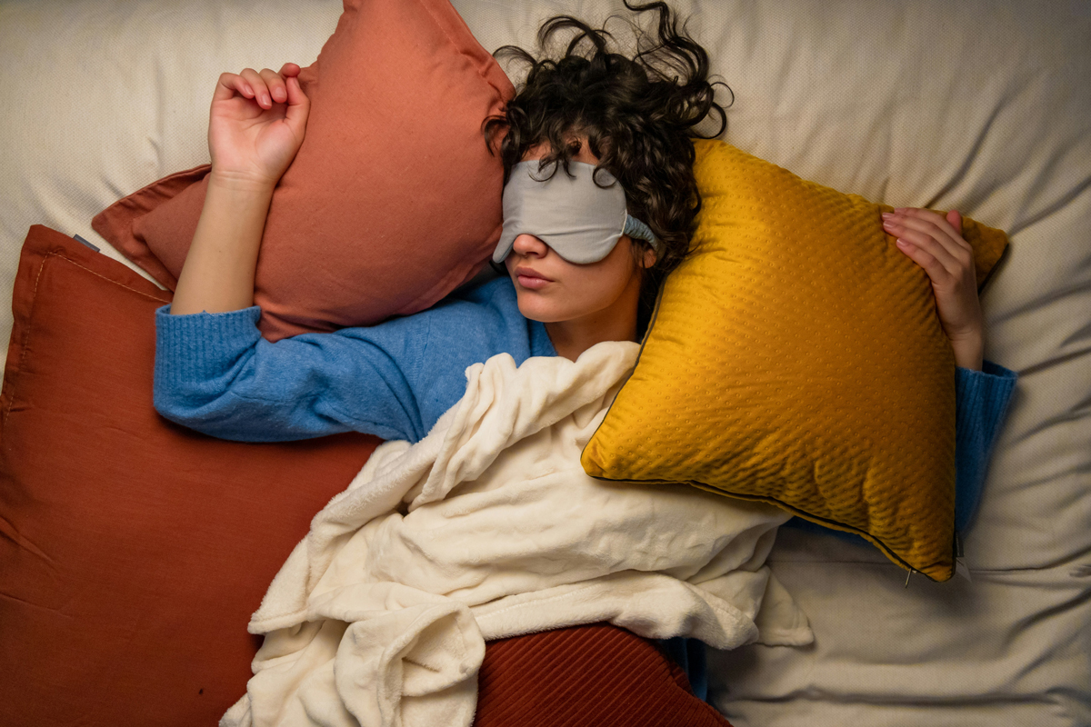 Person sleeping with eyemask